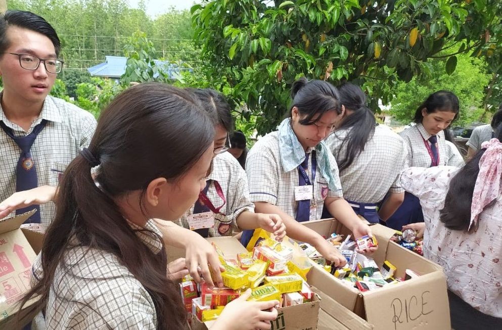 Students of Little Star Higher Secondary School, Dimapur distributing various items as part of its weeklong ‘Charity Week’.